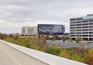 Billboard advertising placement visible from highway