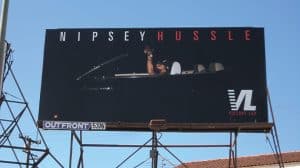 Nipsey Hussle Victory Lap 30-sheet poster billboard on Outfront Media structure