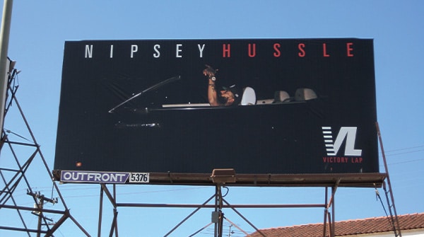Nipsey Hussle Victory Lap 30-sheet poster billboard on Outfront Media structure