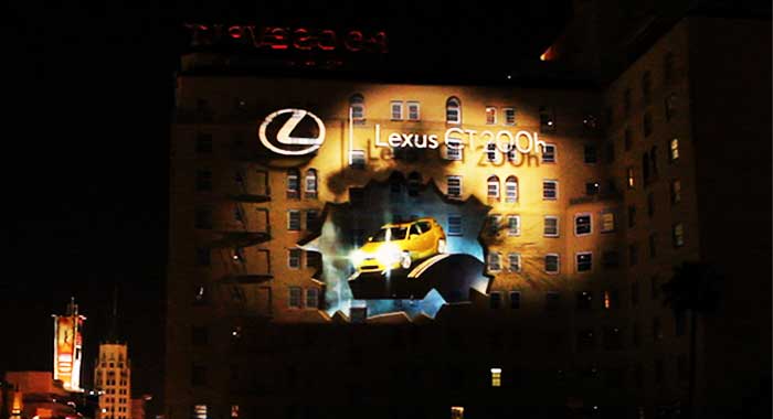 Lexus CT 200h projection mapping advertisement on a building wall in Los Angeles at night