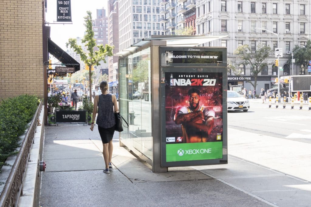 NBA 2K20 advertisement on a bus shelter in New York City