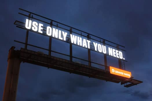 Denver Water billboard with minimalist design and humor