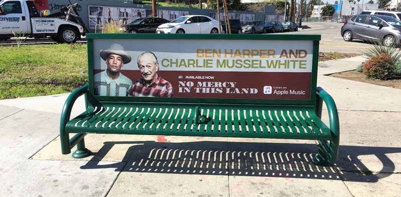 Ben Harper and Charlie Musselwhite "No Mercy in This Land" bus bench ad in Los Angeles