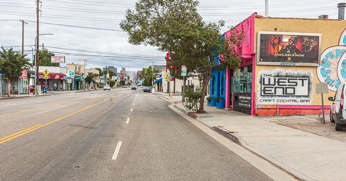 Shy Glizzy 8-sheet billboard advertisement on retail corridor in Los Angeles
