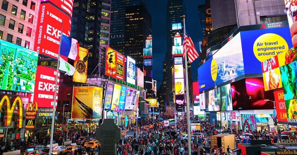 Times Square billboard advertising at night in New York City