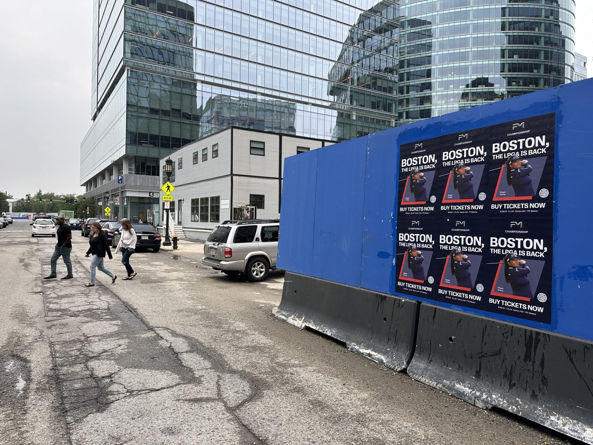 Wild Posting® campaign in Boston's Seaport at Boston Wharf Road and Autumn Lane — FM Championship LPGA "Boston, the LPGA is Back" tournament posters featuring Megan Khang, promoting the August 29 – September 1, 2024 event at TPC Boston in Norton, MA.