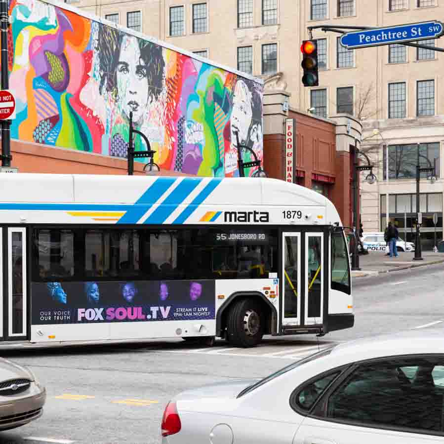 ox Soul bus king advertising campaign on the side of a city bus