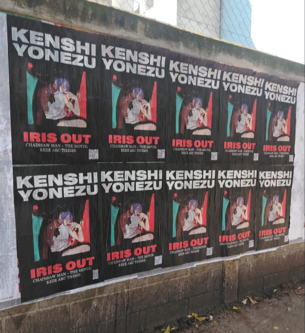 Wild Posting® campaign for Kenshi Yonezu's "IRIS OUT" from Chainsaw Man – The Movie: Reze Arc, wheat-pasted in a 10-poster grid on a Mexico City wall