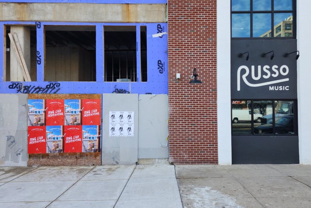 Compass Box Scotch Whiskymakers "Long Live Interesting" wheat pasting campaign next to Russo Music on Frankford Avenue, Fishtown, Philadelphia.