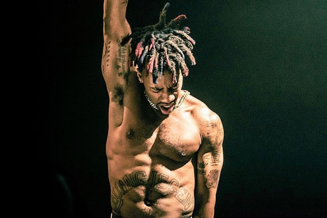 Rapper Dax performing live on stage during his multi-city tour