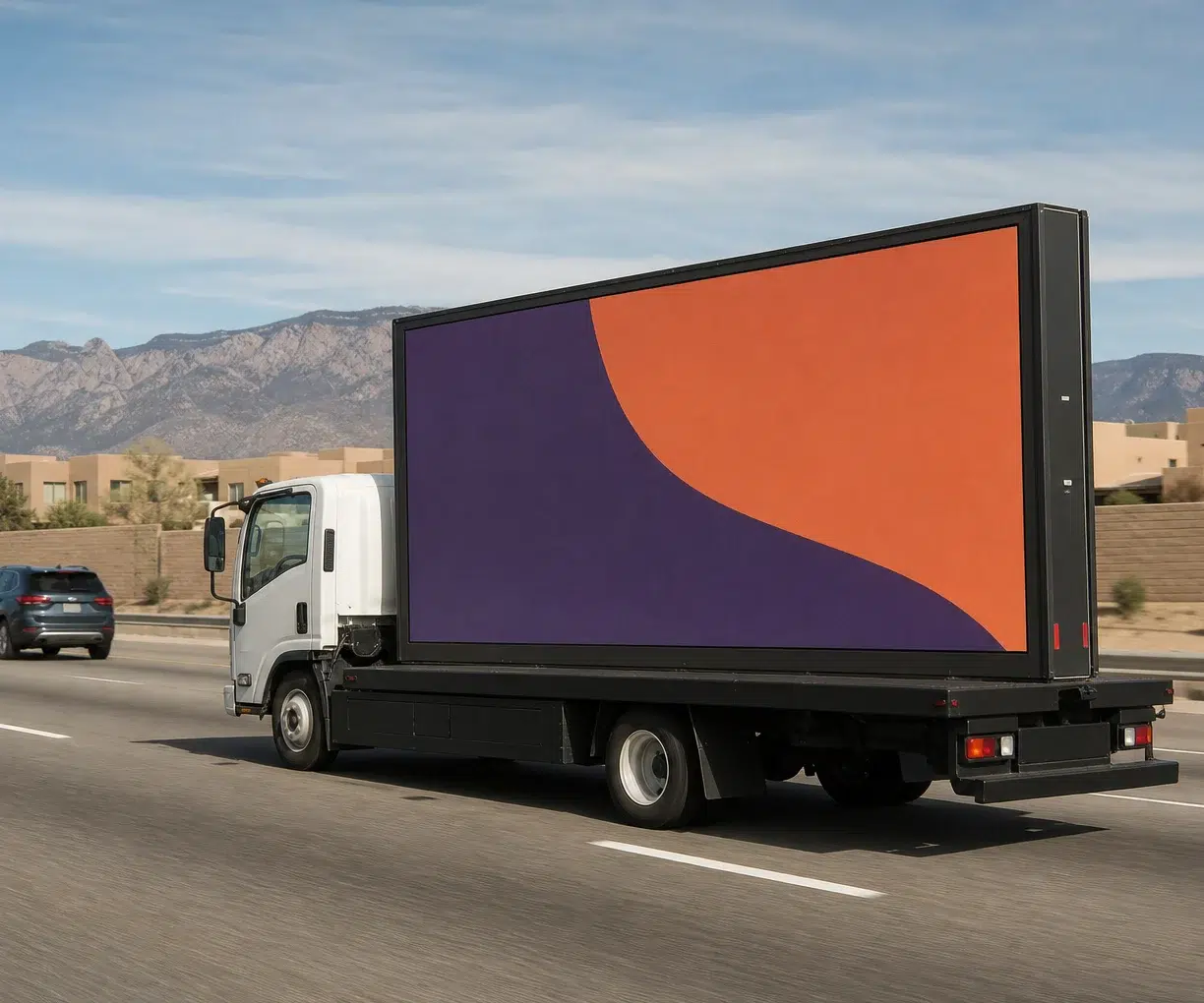 Mobile billboard traveling along I-40 in Albuquerque, NM