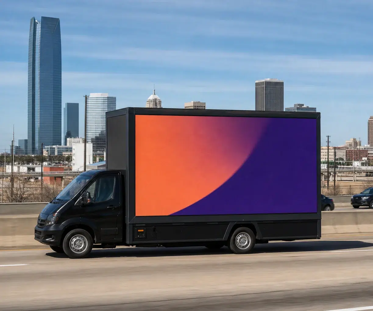 Mobile billboard traveling along I-40 in Oklahoma City, OK
