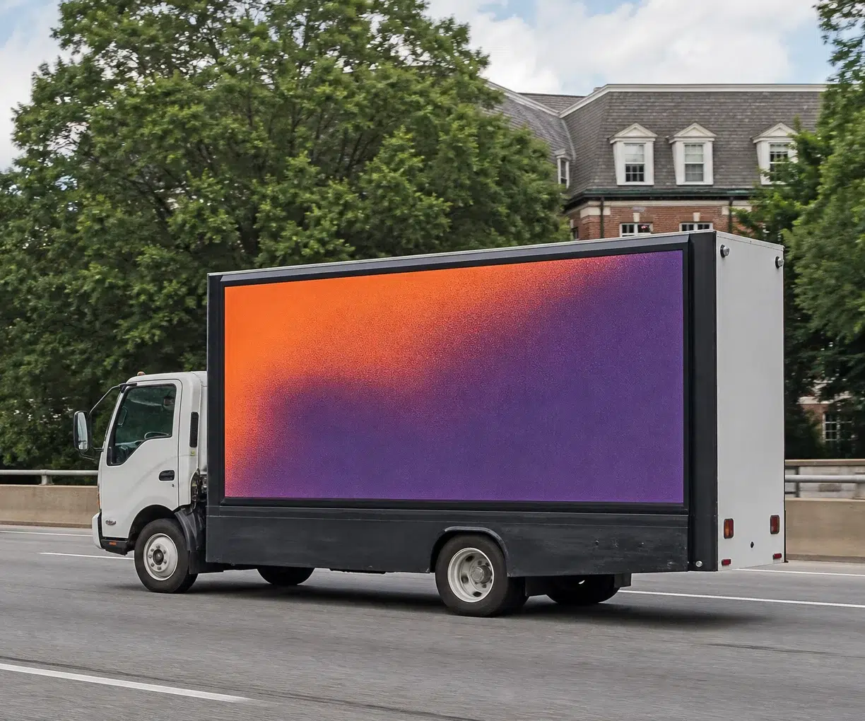 Mobile billboard traveling along I-440 in Raleigh, NC