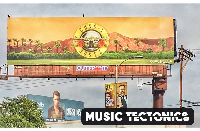 Outdoor billboard for Guns N' Roses set against a desert landscape; a black rounded badge in the foreground reads 'MUSIC TECTONICS'.