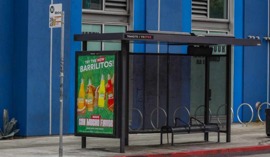 Barrilitos Aguas Frescas bus shelter advertising campaign on Broadway at Cesar Chavez in downtown Los Angeles