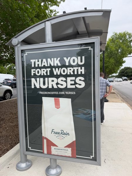 Free Rein Coffee 'Thank You Fort Worth Nurses' campaign on a bus shelter in Fort Worth, Texas